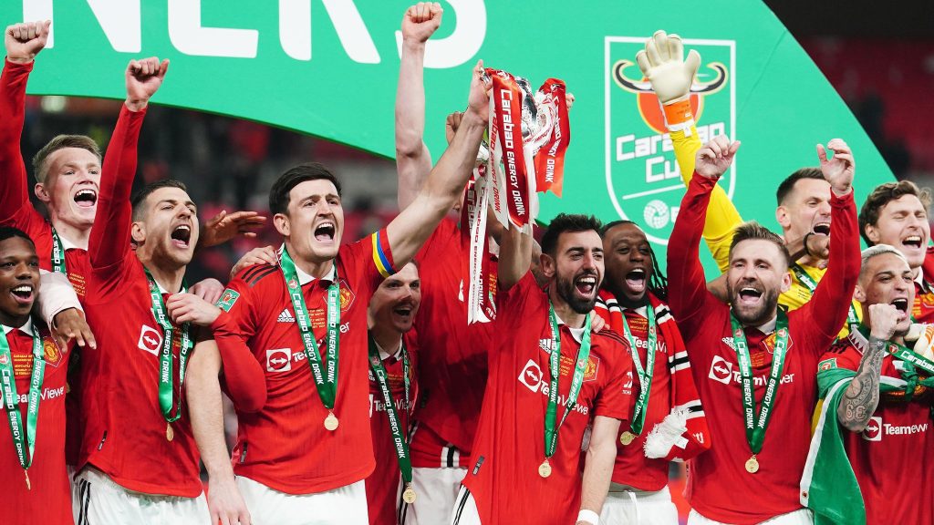 FA Cup finalist Manchester United lifting the Carabao Cup.