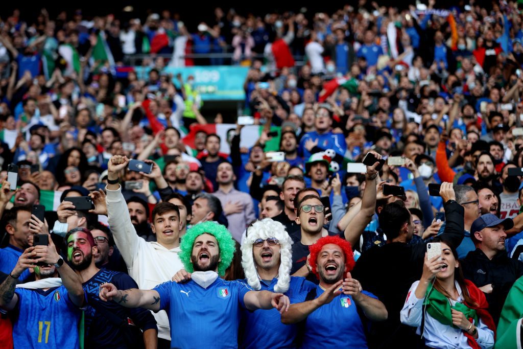 Italian fans and their pizza was chanted on by Scottish fans