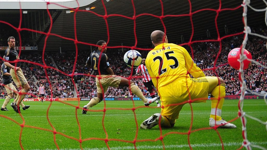 Pepe Reina is dumbf-ounded by a beach-ball