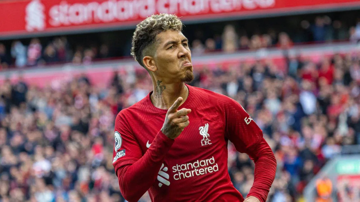 Roberto Firmino, a non traditional centre forward, celebrating a goal