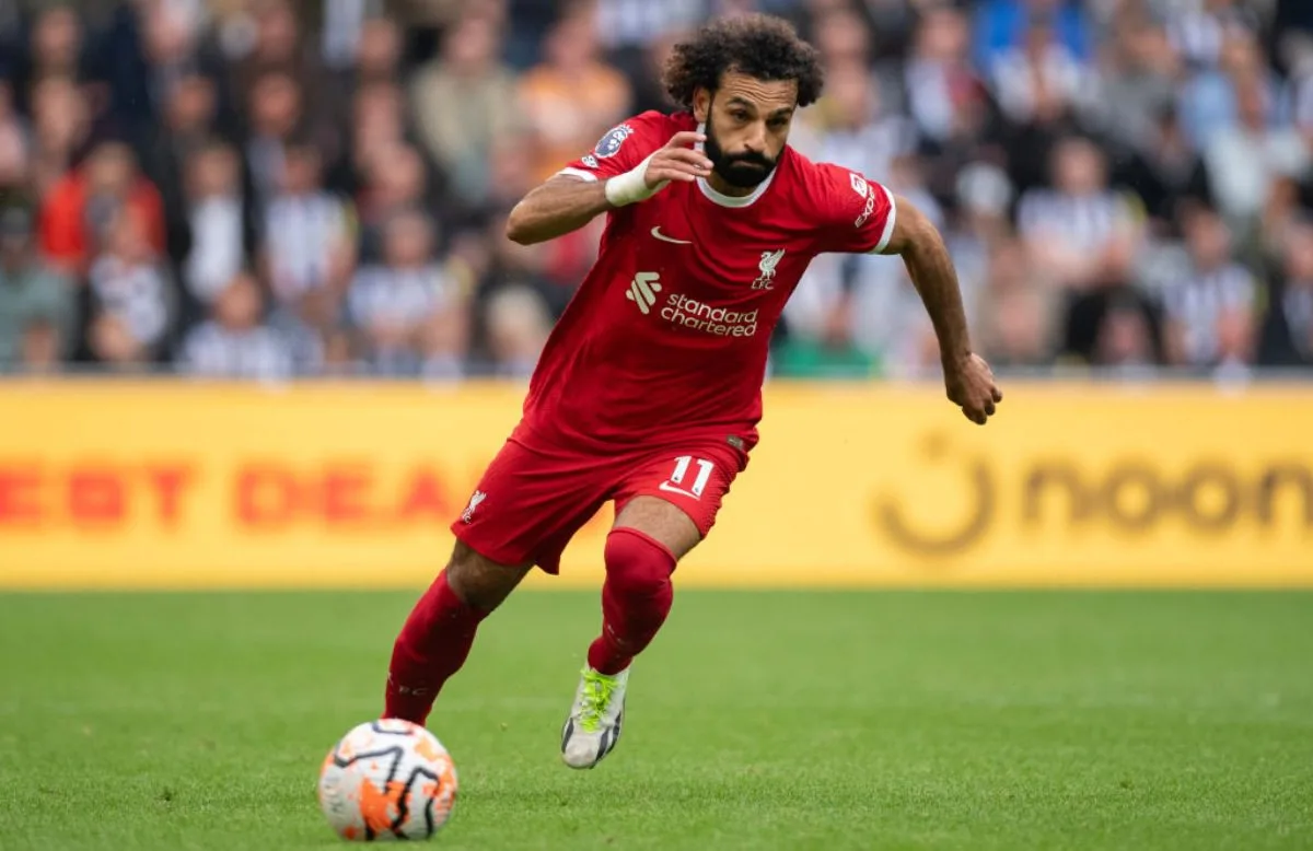 Mo Salah running with the ball