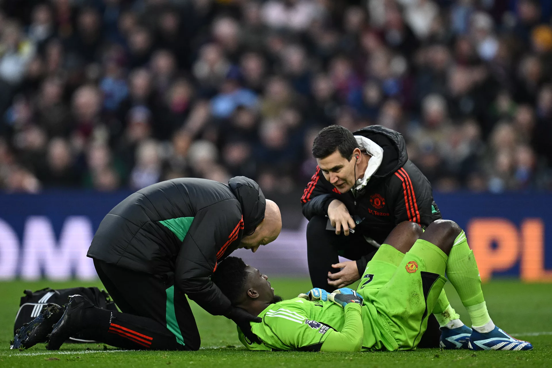 Andre Onana down injured vs Aston Villa