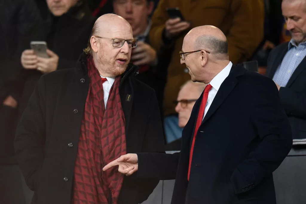 Manchester United need to move fast in transfer market or risk becoming mid-table club 3 Glazer Family at a Manchester United game