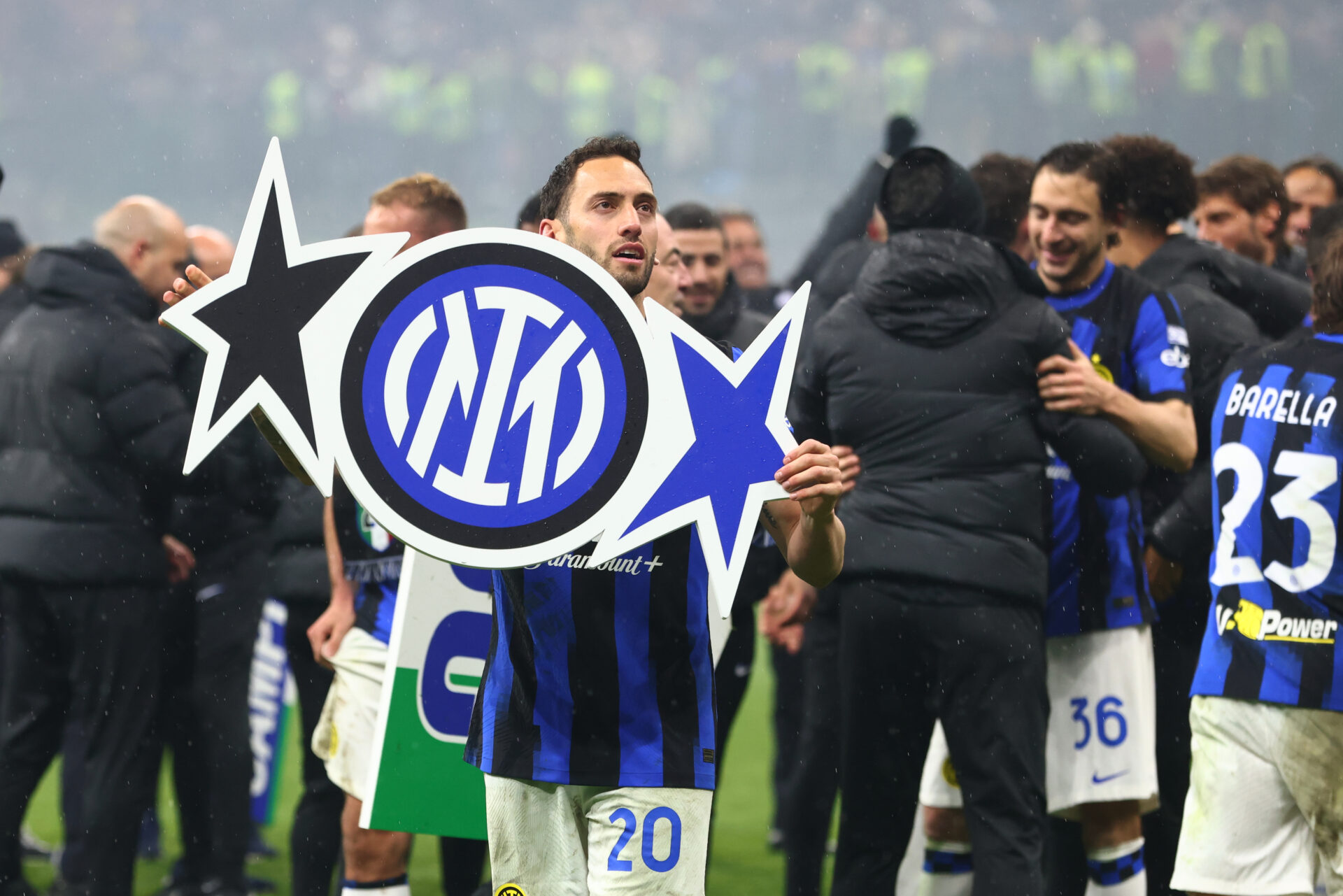 Calhanoglu with Inter two star tifo