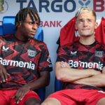 Wirtz and Frimpong sit on bench pre-match
